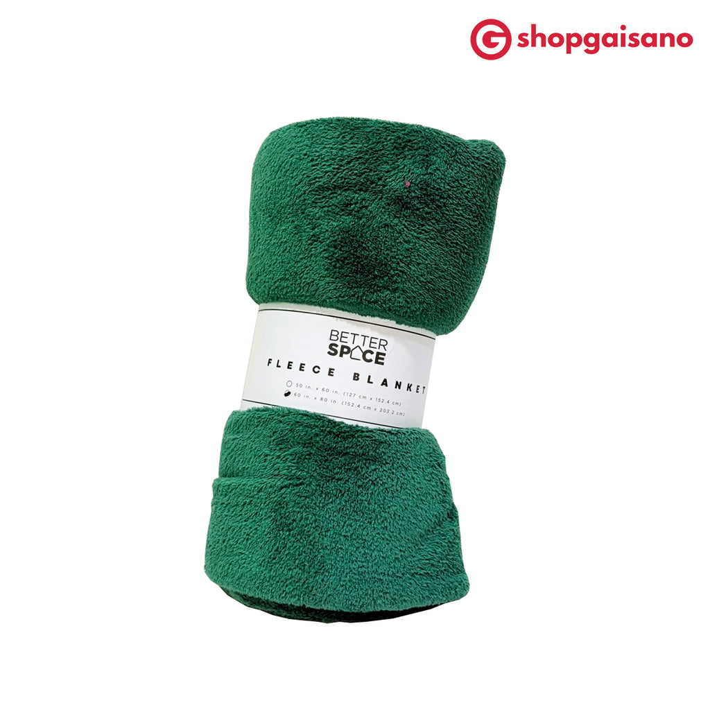 A rolled dark green fleece blanket with a white paper label reading 'BETTER SPCE FLEECE BLANKET', photographed on a plain white background. A red 'shopgaisano' logo appears in the top right corner.
